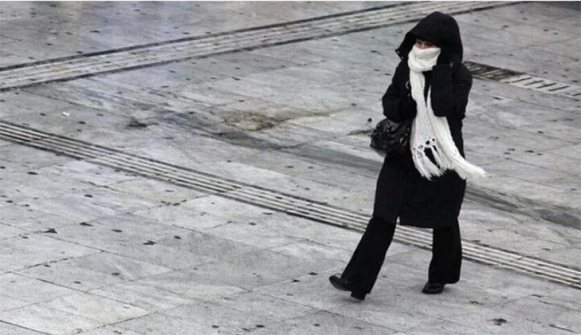 Κυριακή με παγωνιά και βροχές
