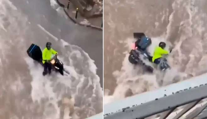 Θεσσαλονίκη: Απίστευτο -Τα ορμητικά νερά από τη νεροποντή παρασέρνουν διανομέα με το μηχανάκι του [Βίντεο]