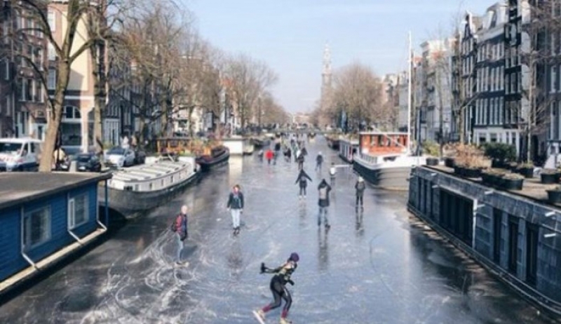 Εντυπωσιακό θέαμα: Κάνουν πατινάζ στα παγωμένα κανάλια του Άμστερνταμ - ΒΙΝΤΕΟ